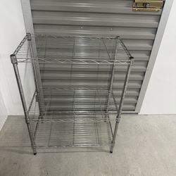 Three shelf metal rack