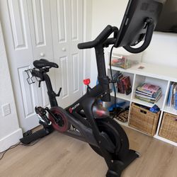 Peloton original Model With Two Pairs Shoes