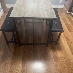 Small Table with bench style chairs