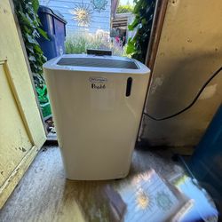 Portable air conditioner with window, accessories, and remote Portable air conditioner with window, accessories, and remote