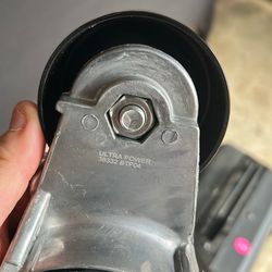 Serpentine belt tensioner