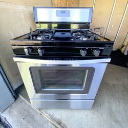 Whirlpool gas stove 4 burners stainless st.  30”