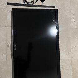 36-inch Samsung TV with wall mount