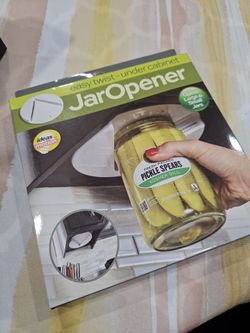 New easy jar opener. Open any size jar cap. 