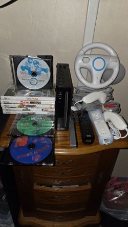 Nintendo Wii Mario Kart Bundle with 8 Games