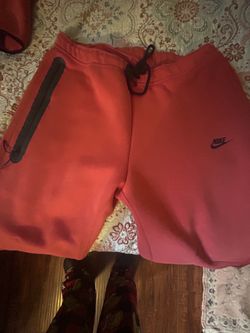 Red NIKE tech Pants