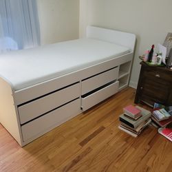 White Twin Bed With Four Drawers And Two Shelves