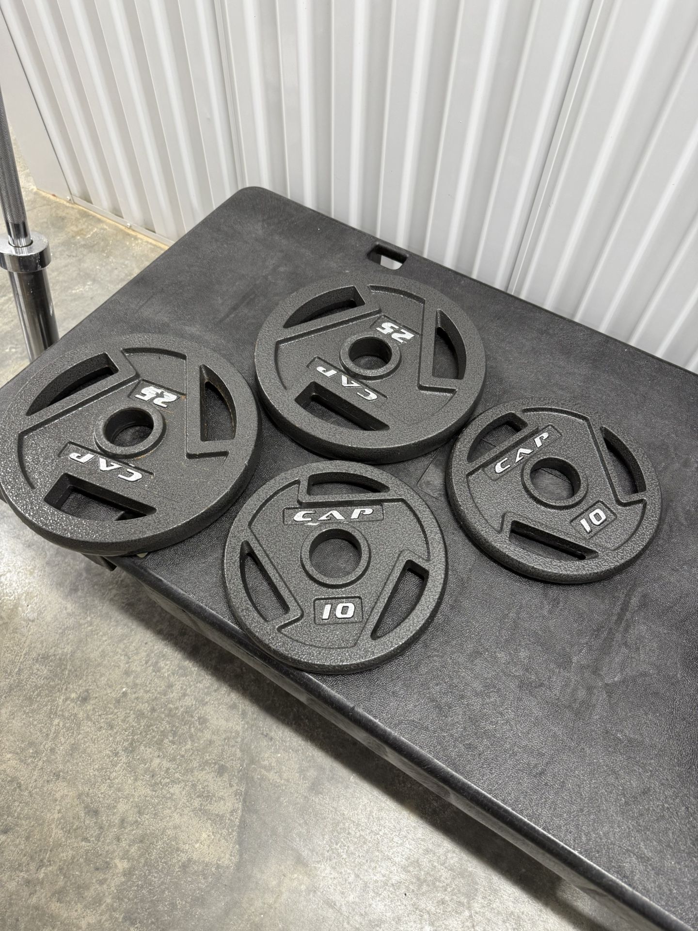 Barbell Bars + Athletic Supply Olympic Grip Plate.