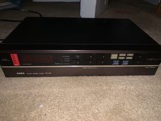 Aiwa digital quartz synthesizer tuner with timer function