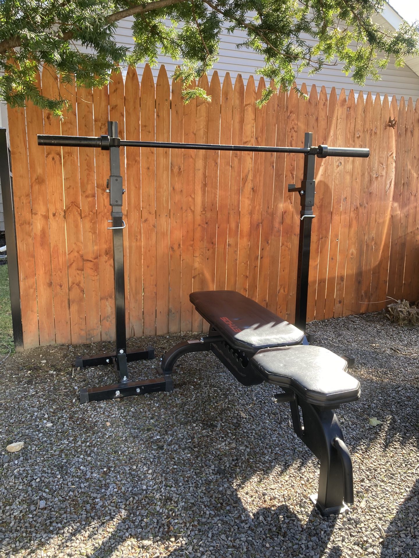 Ethos Heavy Duty Adjustable Bench With A Pair Of Squat Stands And A 6’ Olympic Barbell 