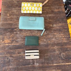 Various used Kate Spade wallets