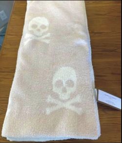 $30….New Cupcakes and Cashmere Skulls and Crossbones light pink doublesided Halloween decorative throw blanket. Size 50” x 60”. Very cute and so soft