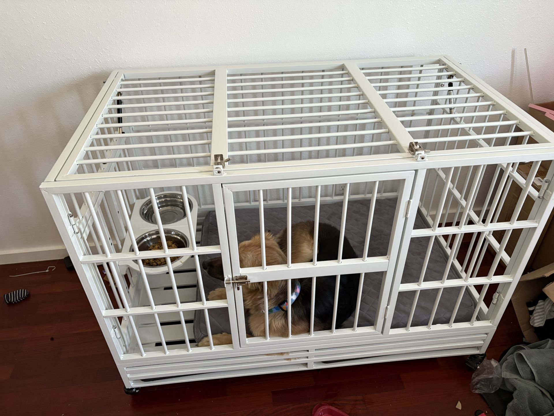 Dog kennel with reversible feeding bowl I have the same thing in a box unopened very easy to build
