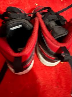 Red and black Nikes