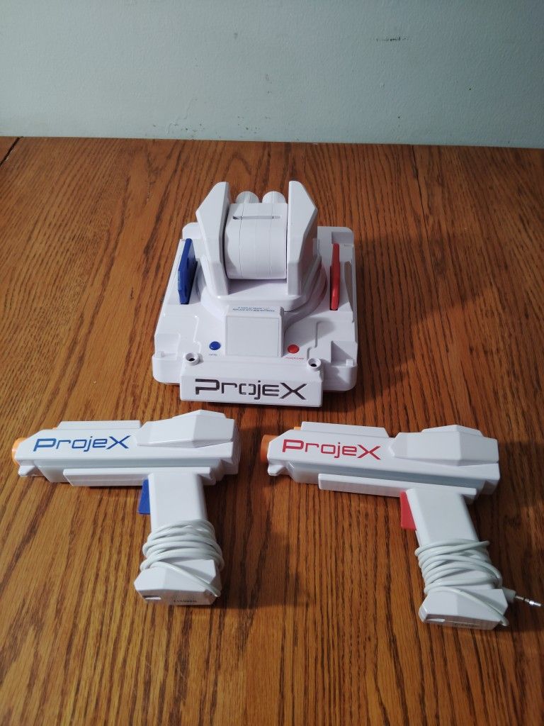 ProjeX Projecting Game Arcade W/ Two Controllers And Two Game Options