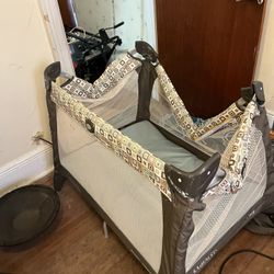 Graco.   Folding.   Playpen. /. Bed.   With.   Over 