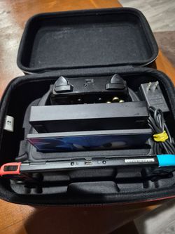 Nitendo switch with sonic mania game, base charger,  controller and carrying case, in very good condition