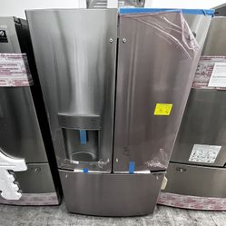 NEW GE FRENCH DOOR REFRIGERATOR IN WITH ICE AND WATER DISPENSER