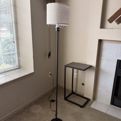 Black Floor Lamp with floor push button.