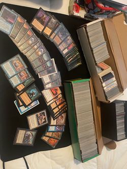 Boxes of old and New Magic the gathering cards