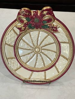 Home for the Holidays decorative ceramic holiday cookie platter featuring a sculpted poinsettia bow.