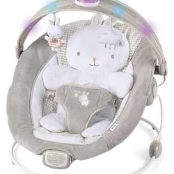 InLighten by Ingenuity Twinkle Tails Vibrating Infant Baby Bouncer with Lightning Toy Bar and Pillow