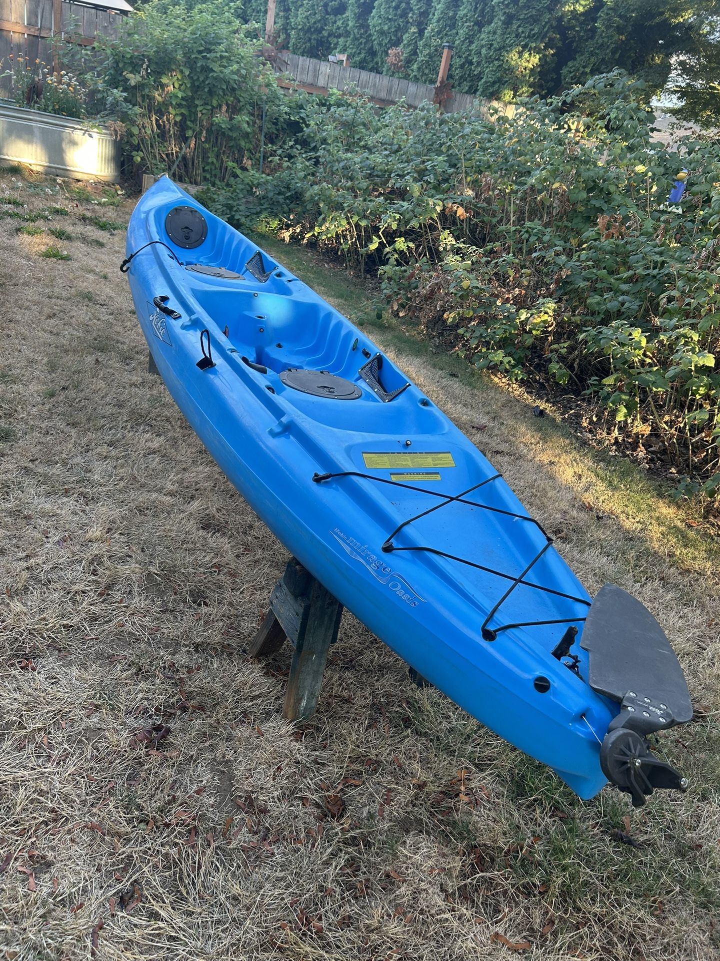 Selling my tandem Hobie  Mirage Oasis kayak with two mirage drives and turbo fins. Includes the paddles and a carry cart. I have one seat for it so yo