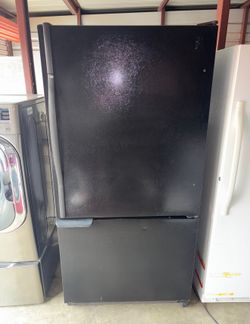 Black Amana Refrigerator And Freezer