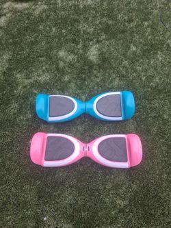 Two Self-Balancing Hoverboards Blue and Pink