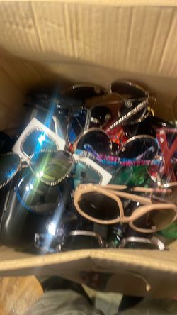 21 pairs of sunglasses 10 reading glasses