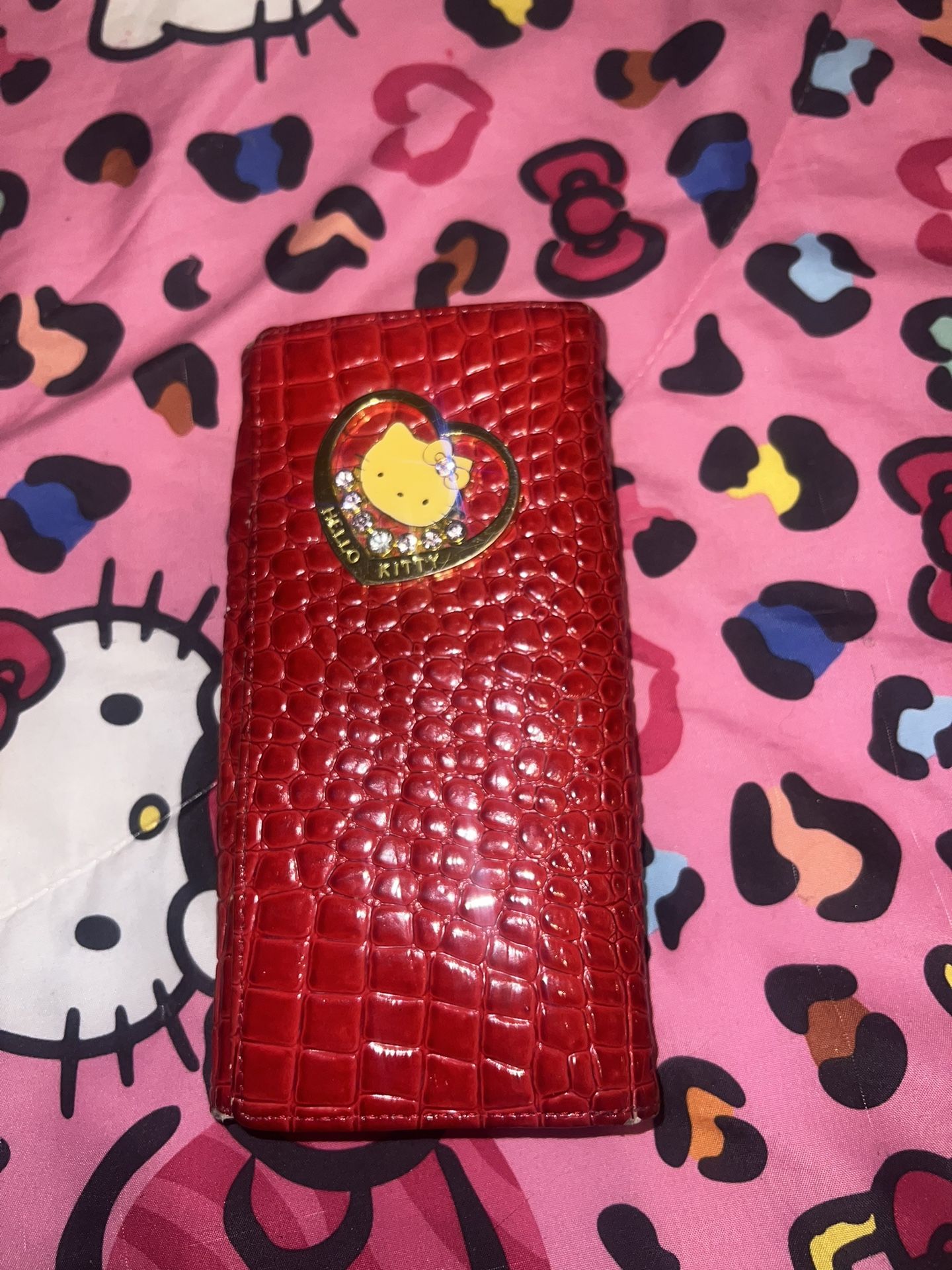 red and gold Hello kitty leather wallet