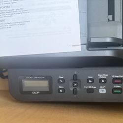  Brand new Brother DCP-L2540DW Laser Printer. Never used — still in original box with all packaging and manuals