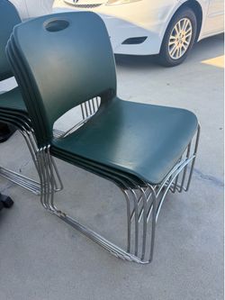 9 green chairs