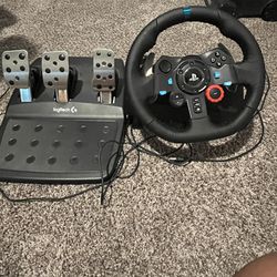 Logitech G29 steering wheel and pedal