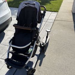 Mocking Stroller With Toddler Attachment 