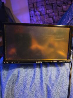a Sony XAV-AX3200 6.95-inch multimedia car stereo receiver.