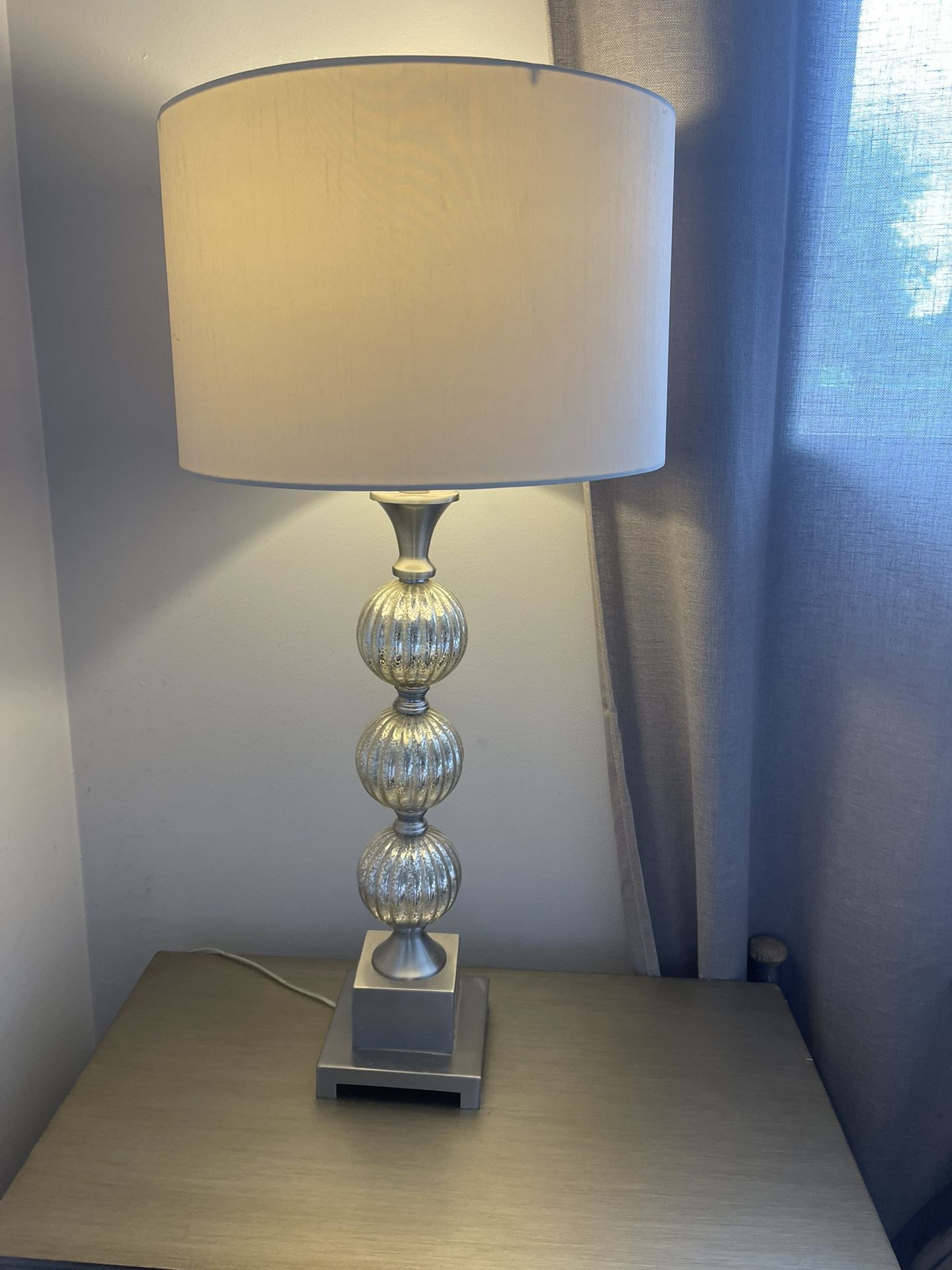 Two Silver Lamps