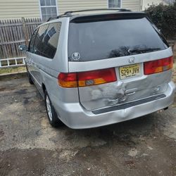 Clean Title Titulo Linpio Honda Odisey  2002  240,000 Millas Sin Luz En El Tablero Todo Estavien  Precio De Benta  Conpre Otra Mas Grande 