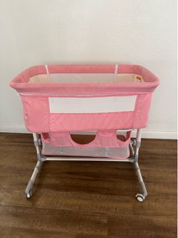 Pink baby bassinet, brand new