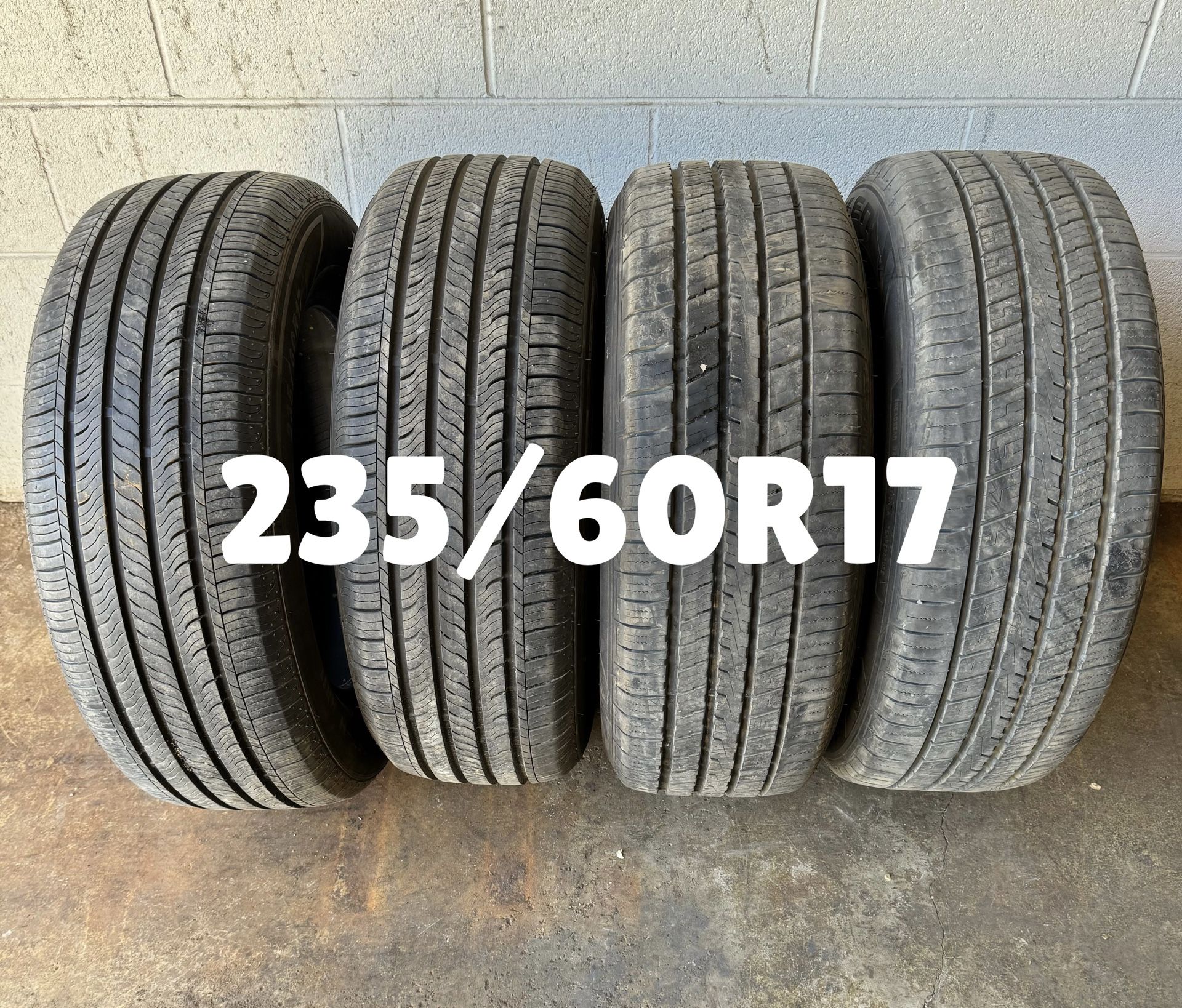 Four 235/60R17 Tires