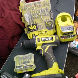 Ryobi Hammer drill W/2 Batteries. Charger& Extras