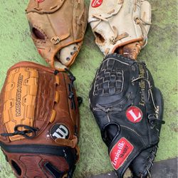 Four Baseball Gloves