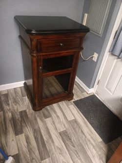 Granite Counter Tops And Cherry Wood Wine Cooler