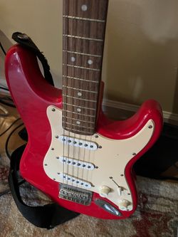 Red Stratocaster-Style Electric Guitar