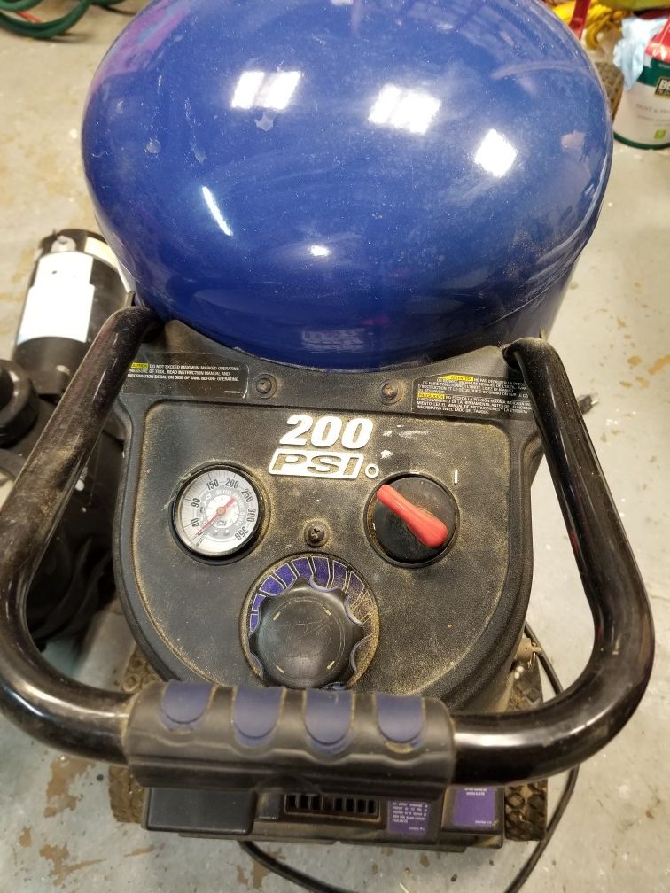 Air compressor with tools and hose