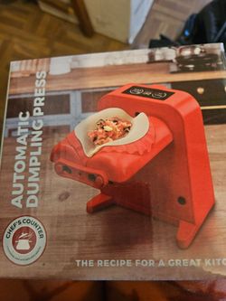 Auto dumpling press