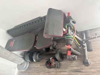 Bench , Weights And Elastic Bands