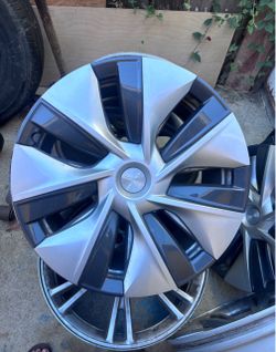 2022 Tesla model y stock rims and caps