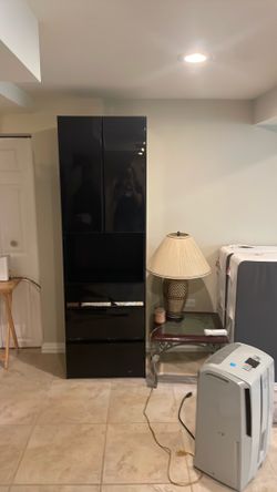 black lacquer cabinet with drawers
