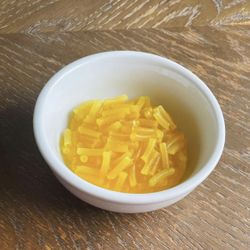 Macaroni and cheese candle 